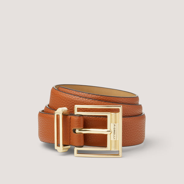 A stylish, tan belt with a sleek gold buckle.