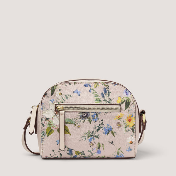 Elevated with a summer botanical print, the Anouk crossbody bag features shiny gold-tone hardware.