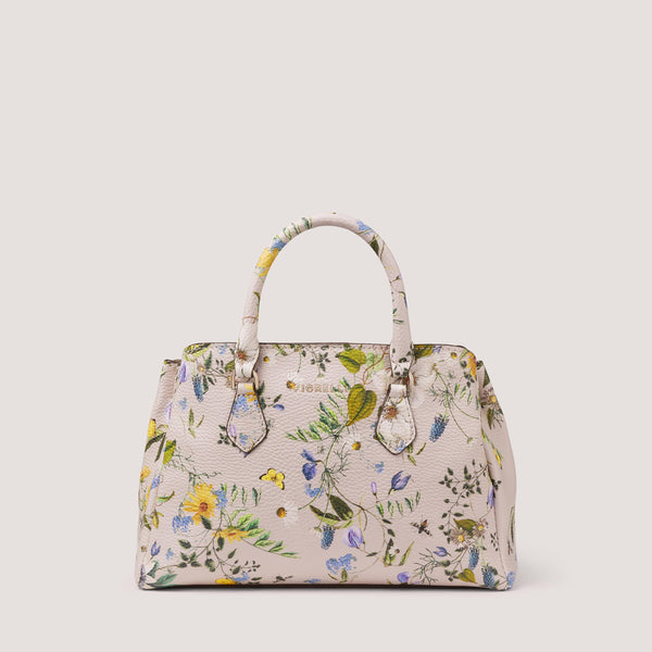 The Paloma mini handbag in white floral print features a detachable and adjustable shoulder strap and three practical compartments.