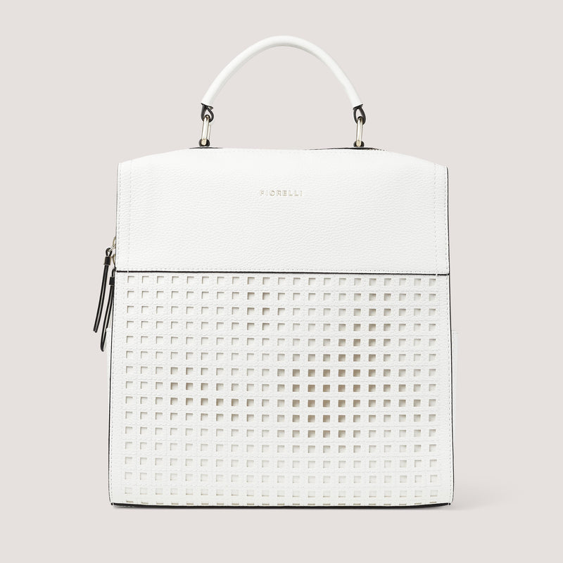 The Anna backpack is the perfect travel companion. It is detailed with an intricately laser-cut geometric pattern.