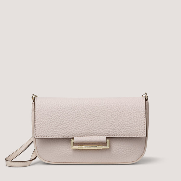Our new classic white Nova style can be worn as a crossbody, shoulder or clutch thanks to a removable and adjustable strap