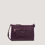 Burgundy croc crossbody bag with concealed zip pocket.