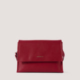 Red crossbody bag with magnetic flap.