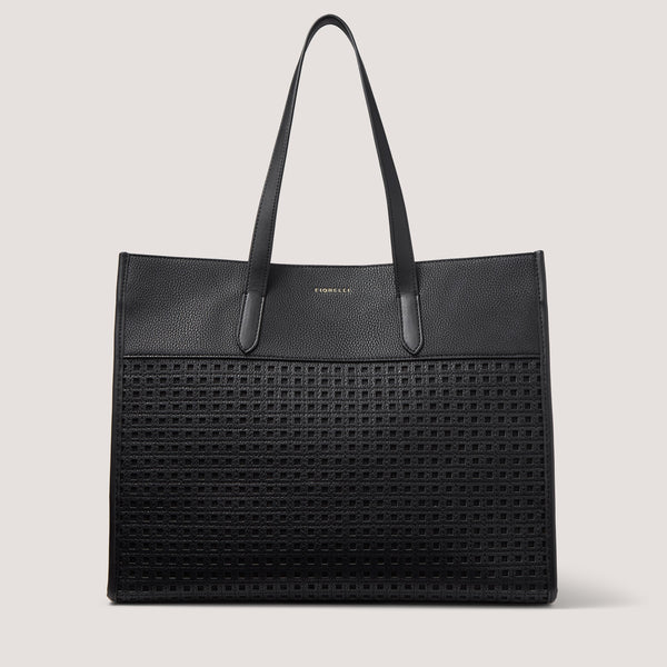 The Sol tote bag is fully lined with Fiorelli's signature logo-jacquard lining and features a magnetic closure.