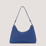 Cobalt blue small shoulder bag with elongated D-rings.