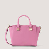 Pink mini crossbody bag with a slim, adjustable strap.