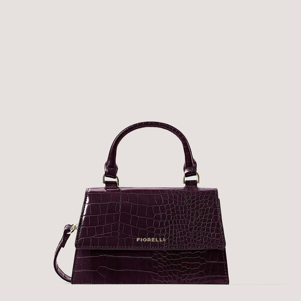 Burgundy croc mini top-handle bag with gold hardware.