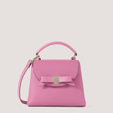 Pink mini handbag with bow detail.