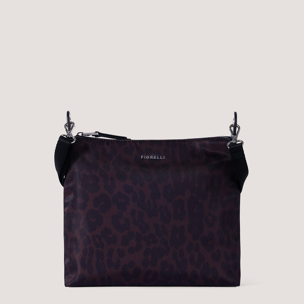 Leopard print nylon crossbody bag with statement hardware.