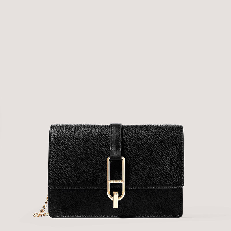 Black clutch bag with a detachable chain strap.