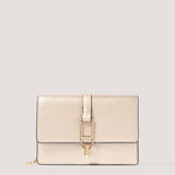 Gold clutch bag with a detachable chain strap.