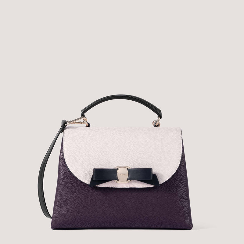 Burgundy, black and white handbag with bow detail.