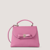 Pink handbag with bow detail.