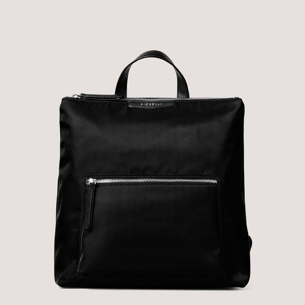 Black nylon backpack with reverse zip pocket.