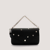 Black crossbody bag with gold-tone chain handle.