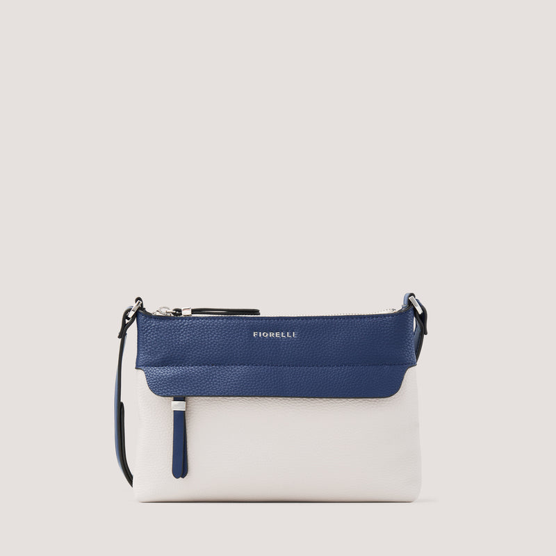 Light-stone and nautical-blue crossbody bag with concealed zip pocket.