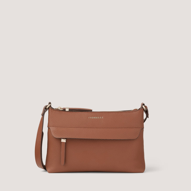 Tan-brown crossbody bag with concealed zip pocket.