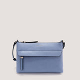 Cornflower blue crossbody bag with concealed zip pocket.