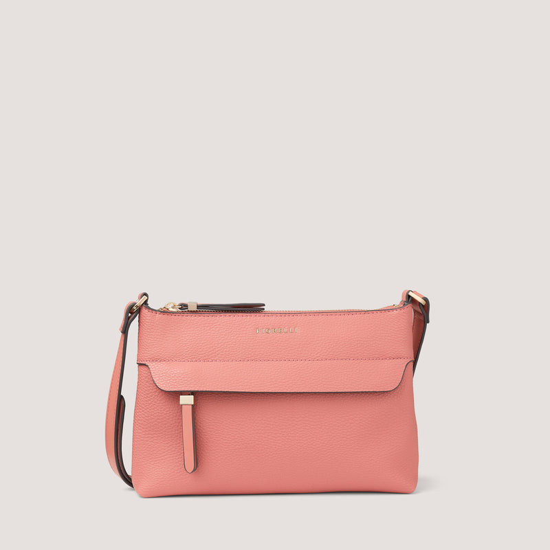 Camellia-pink crossbody bag with concealed zip pocket.