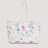 Wildflower print tote bag with detachable pouch.