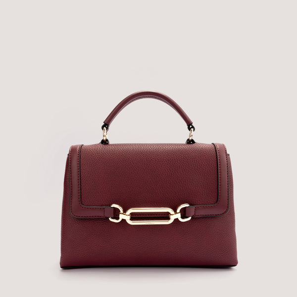 Port Red top-handle bag with crossbody strap.