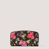 Floral print purse with multiple compartments.