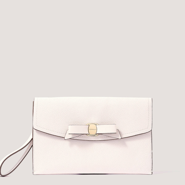 White envelope clutch with bow detail.