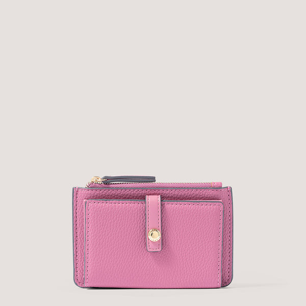 Pink coin purse with a photo window.