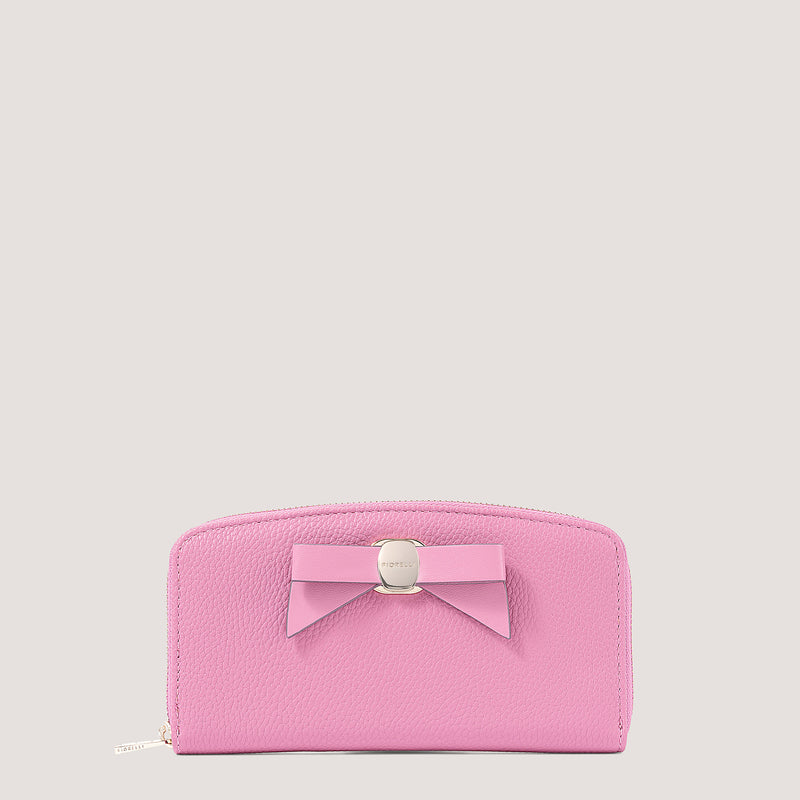 Pink purse with bow detail.