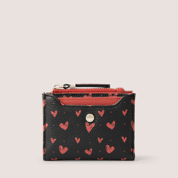 Scattered heart print bifold wallet with detachable cardholder.