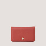 Hot-sauce red bifold purse with branded hardware.