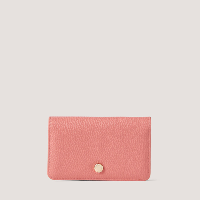 Camellia-pink bifold purse with branded hardware.