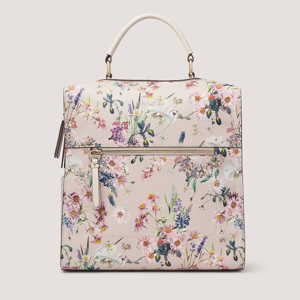 Fiorelli's white floral print Anna backpack can also be carried by the grab top handle.