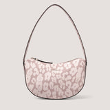 The Gaia handbag calls to mind iconic '90s styles. It's made from smooth faux leather in a playful pink leopard print.