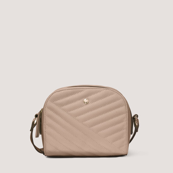 We've updated the classic crossbody camera bag to create this season's must-have crossbody in our new mink quilt.