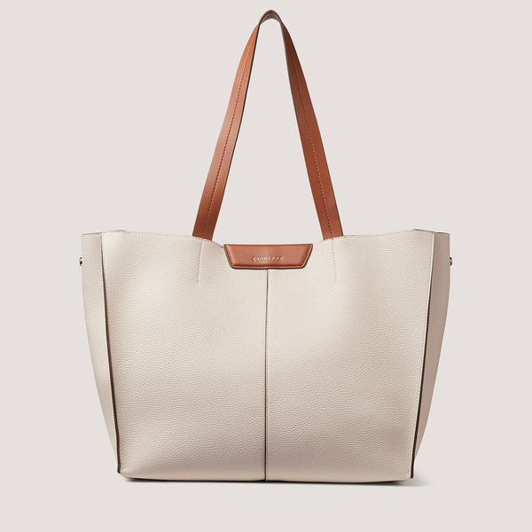 Introducing Chloe - our new tote in a chic white and tan mix.