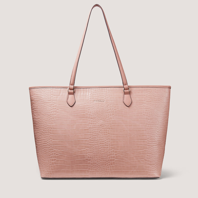 The carry everything bag you need in your life is one new zip top Thea tote in dusky pink croc.