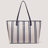 The carry everything bag you need in your life is one new zip top Thea tote in navy stripe.