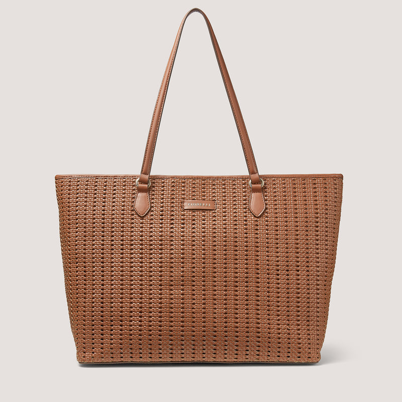 The carry everything bag you need in your life is one new zip top Thea tote in tan weave.