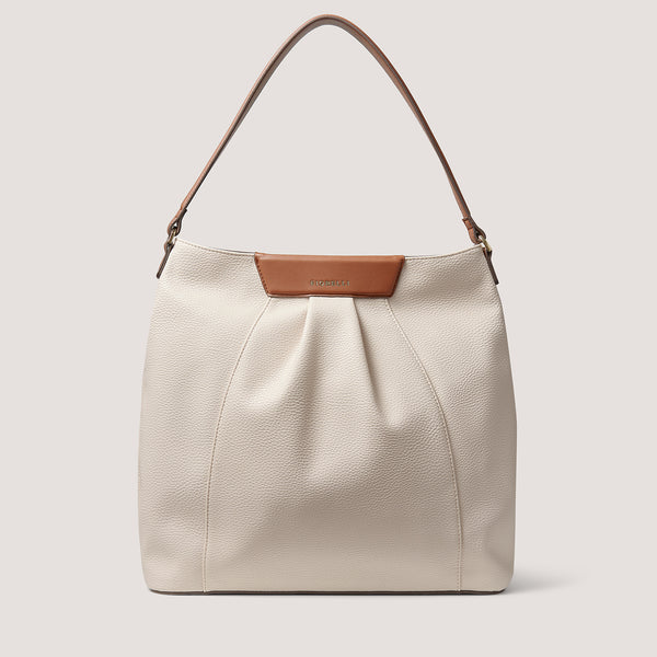 A classic soft and luxurious white tan mix tote crafted from our signature faux leather. 