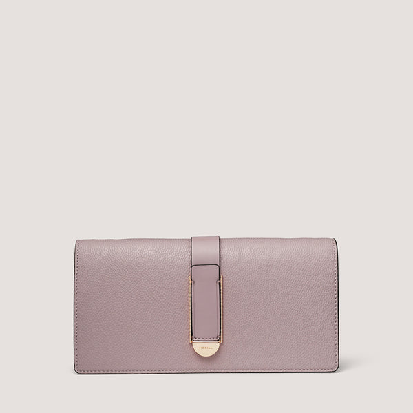 An understated and elegant new lilac clutch bag that is the perfect day to night companion.