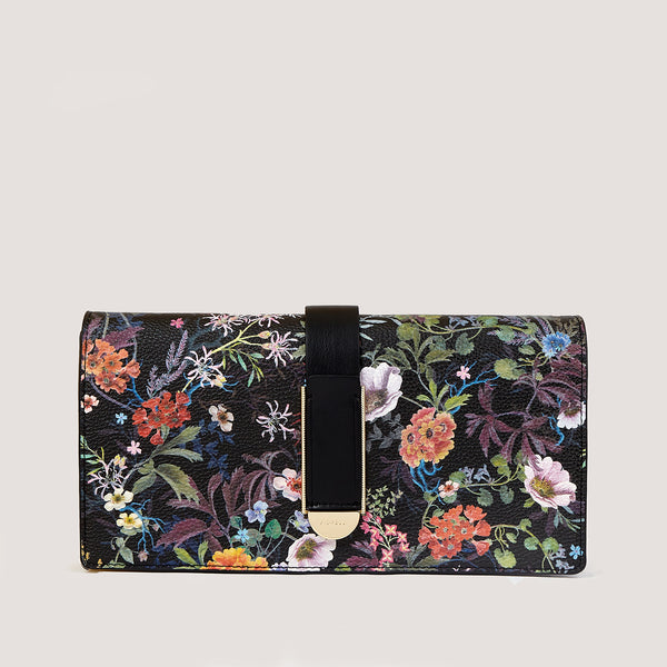 An understated and elegant new enchanted forest clutch bag that is the perfect day to night companion.