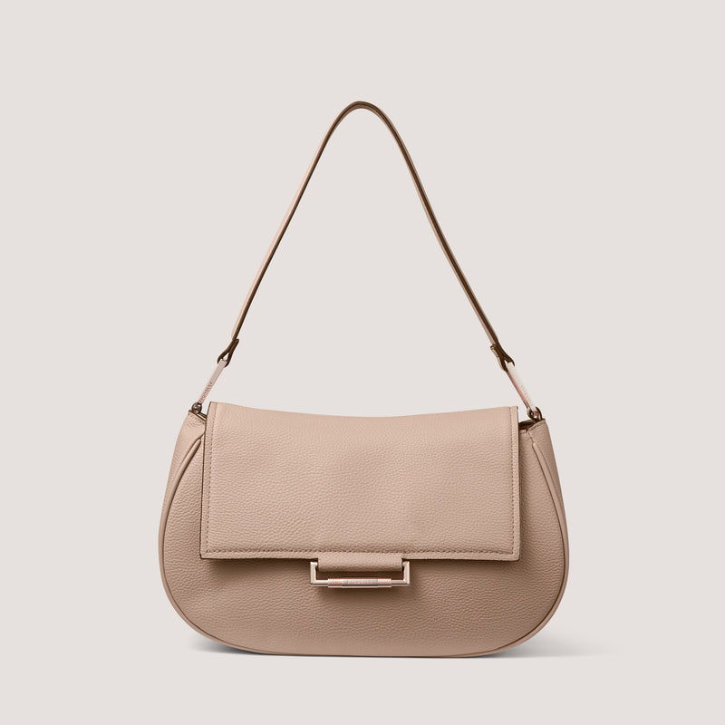 Our new Nova shoulder bag in mink has been crafted in our signature faux leather.