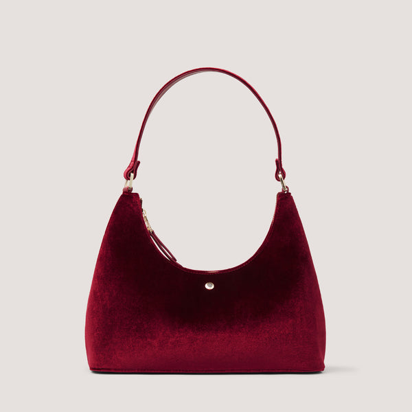 Meet your new ret velvet must-have shoulder bag this season. Forever on trend, this minimalist handbag will be in your style rotation each season.