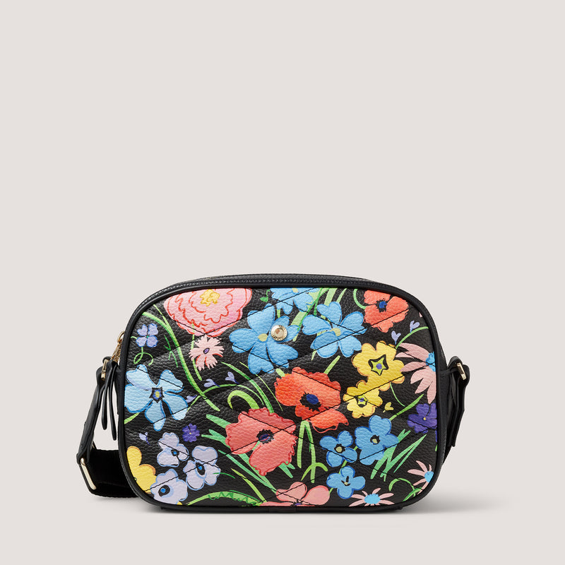 Updated for the new season, the floral-printed camera-style Lyra crossbody bag has an adjustable webbing strap that lends a sporty feel.