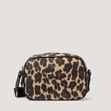 Updated for the new season, the leopard print camera-style Lyra crossbody bag has an adjustable webbing strap that lends a sporty feel.