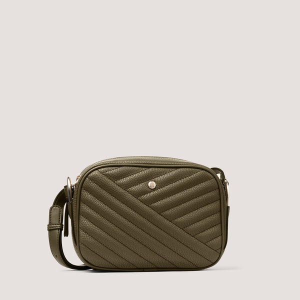 Introducing our chic, curved and casual crossbody bag in khaki quilt, Beau,