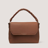 Encapsulating a bohemian charm, the tan Eva shoulder bag is characterised by its artfully braided handle.