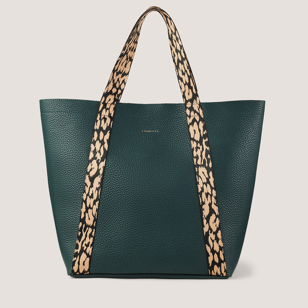 This season's new 'take me everywhere' tote is the Lyra in spruce green.