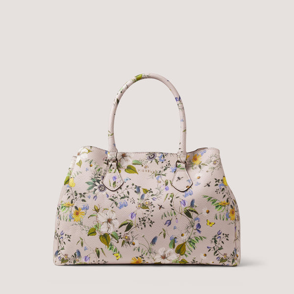 Designed to be worn multiple ways, the summer botanical print Paloma handbag can be worn across the body or in the crook of your arm.